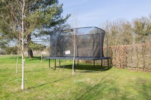 jumpking deluxe trampoline setup outdoors for gymnastics